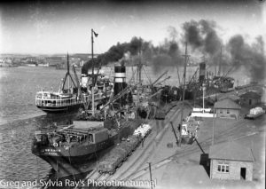 Ship Iron Knob at the BHP Steelworks wharf at Newcastle, circa 1930s. (2)