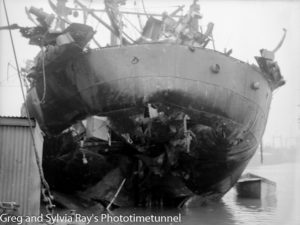 The torpedo-damaged ship Allara in Newcastle Harbour, July 1942. (13)