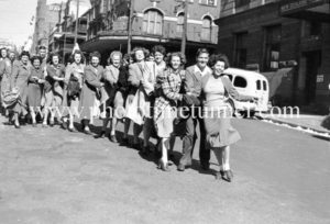 Conga line of revellers in Newcastle, NSW, at the end of World War 2, August 15, 1945. (2)