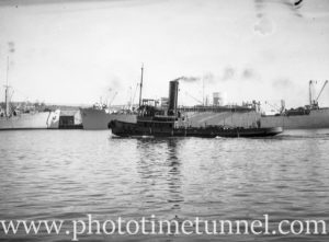 Tug and shipping in Newcastle Harbour, NSW, circa 1946. (1)
