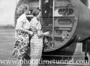 Girls inspecting Japanese mini-submarine at Newcastle, NSW, October 5, 1942.