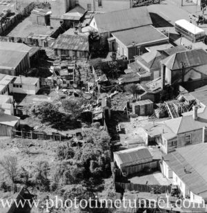 Aerial view of The Junction, Newcastle, NSW, after a RAAF Sabre jet fighter crash on August 17, 1966. (21)