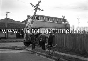 Double-decker bus after a collision with a power pole at Tudor Street, Hamilton, Newcastle, NSW, October 4, 1951. (2)