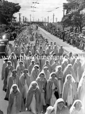 Catholic Church members in procession at Newcastle, NSW, during the 1938 Eucharistic Congress. (1)