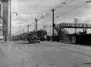Cars and tram, Scott Street, Newcastle, NSW, 1936.