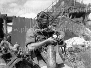 Miner with breathing gear at damaged Ayrfield Colliery at Rothbury Estate in the Hunter Valley, March 8, 1949.