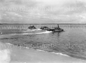 Amphibious vehicles in the water at Gan Gan army camp, Port Stephens, NSW, February 28, 1960.