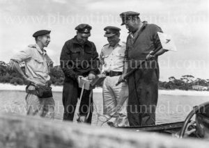 Officers standing on an amphibious vehicle at Gan Gan army camp, Port Stephens, NSW, February 28, 1960. (2)