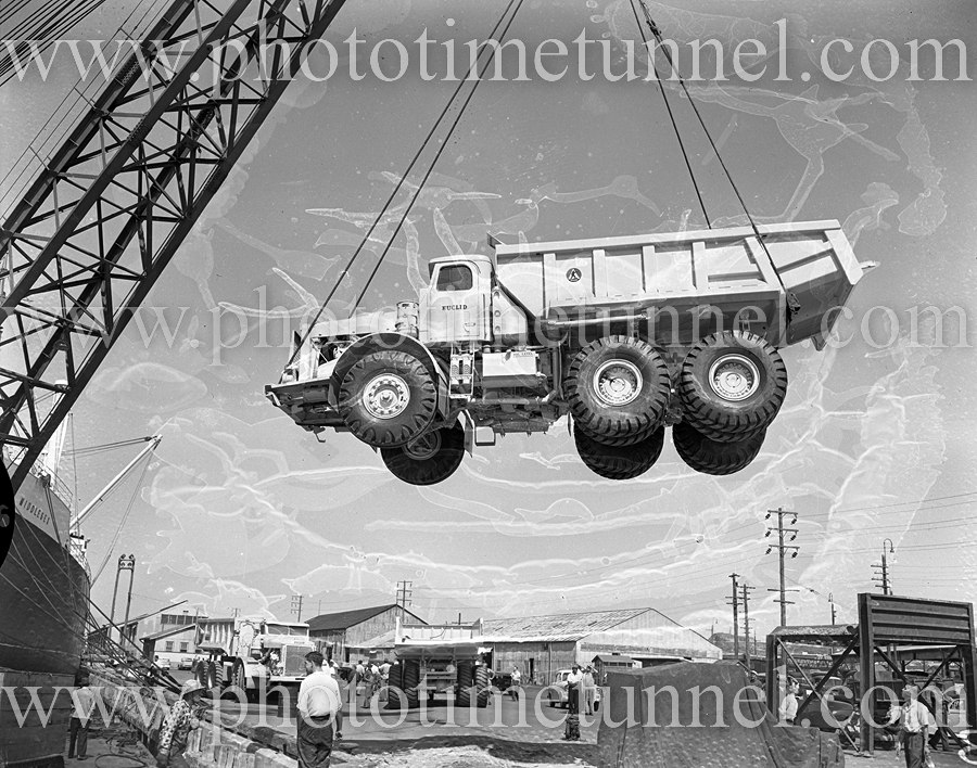 Euclid truck being unloaded from ship Middlesex, Newcastle Harbour, NSW,  December 12, 1959. (5) - Photo Time Tunnel