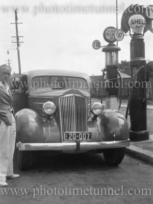 Packard sedan at a Shell petrol station, circa 1930s.