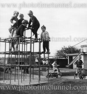 Children on monkey bars at Wickham School,  Newcastle, NSW, May 1971.