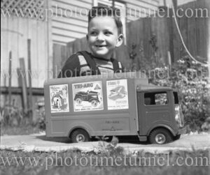 Boy with a Tri-ang toy truck, August 26, 1950.