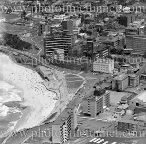 Aerial view of Newcastle East, NSW, showing beach, hotels and hospital, circa 1970s.
