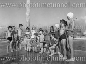 Tot Young giving swimming lessons at Newcastle Ocean Baths (NSW), February 18, 1961
